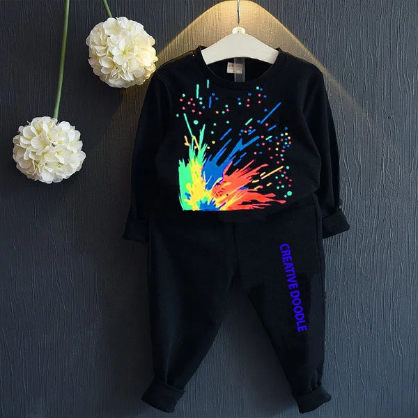 Multi colour print shirt and trouser dress for girls and boys